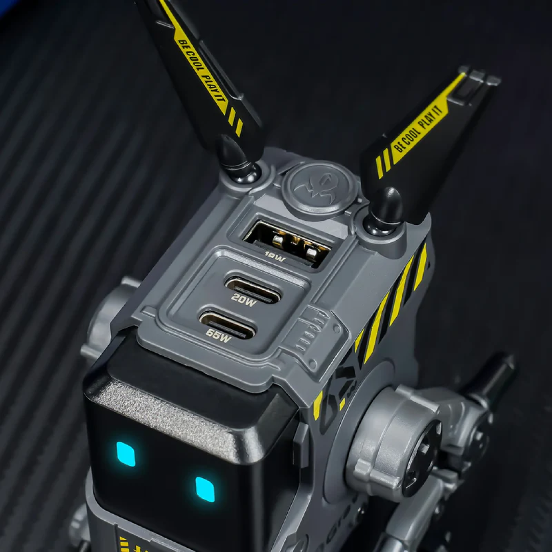 The Alpha65 Gray is the GaN 65W fast charger from GravaStar in a darker, more neutral gray finish. It maintains the same specs and “mecha robot” styling as the other versions but with a more subtle aesthetic.