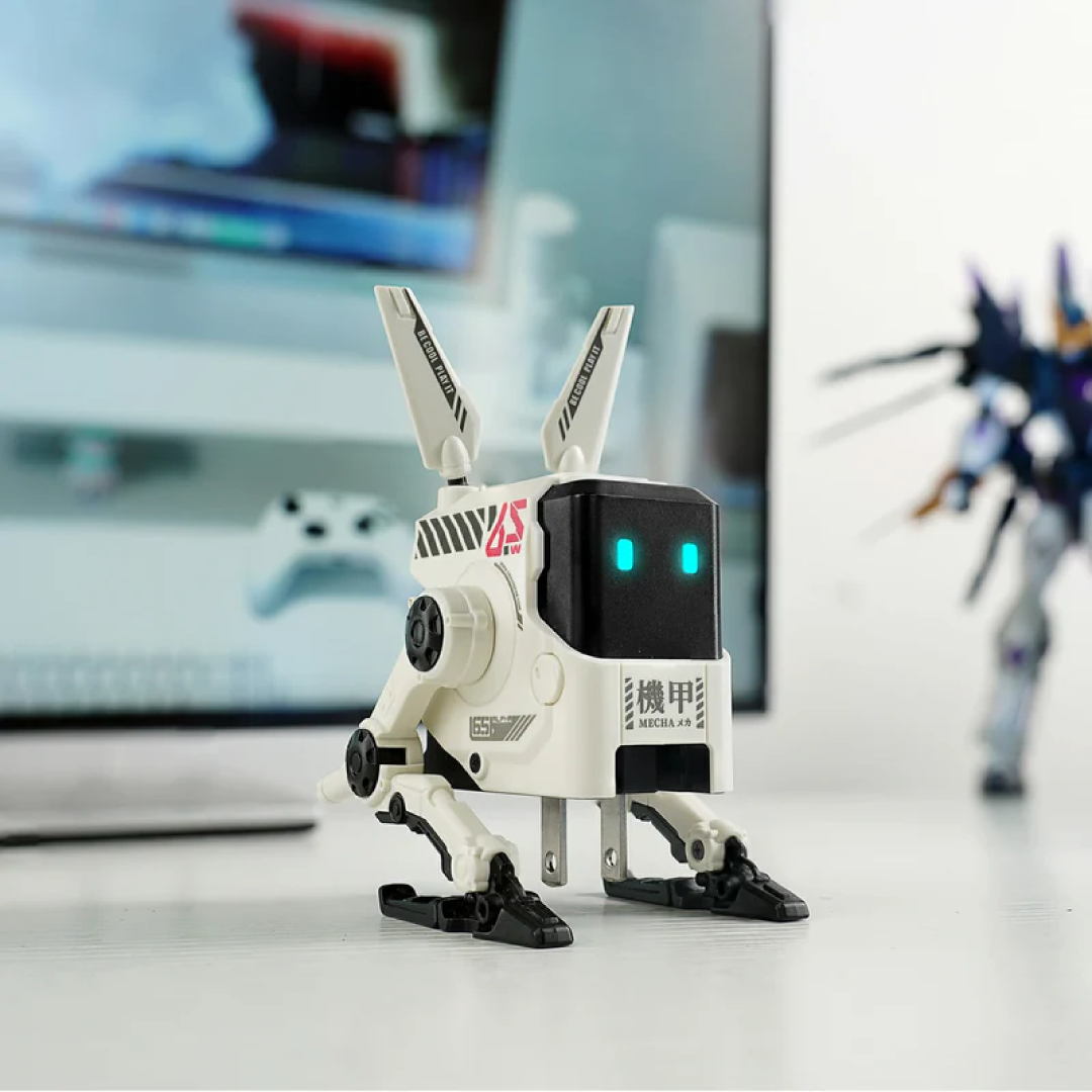 The Alpha65 is a stylish, high-performance GaN (Gallium Nitride) wall charger from GravaStar, designed to combine futuristic aesthetics with practical power delivery. The white (Dawn White) variant gives it a clean, modern appearance that fits well with minimalist or light-themed setups.