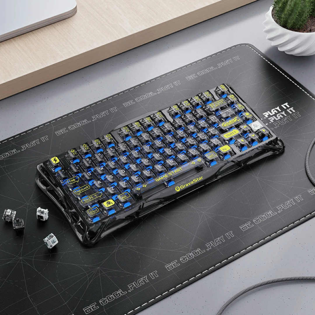75% mechanical gaming keyboard that seamlessly blends futuristic aesthetics with high-performance features. Designed for gamers and enthusiasts, it offers a compact layout, customizable RGB lighting, and versatile connectivity options.