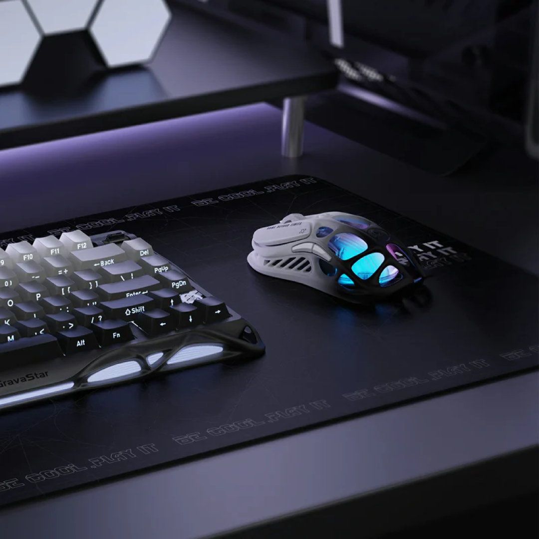 The Mercury M1 Pro – Gradient Black is a premium gaming mouse that combines advanced technology with a sophisticated design. Crafted from durable magnesium alloy, it features a hollowed-out frame that not only reduces weight but also enhances airflow, keeping your hand cool during intense gaming sessions. The gradient black finish adds a touch of elegance, making it a standout accessory for any gaming setup.